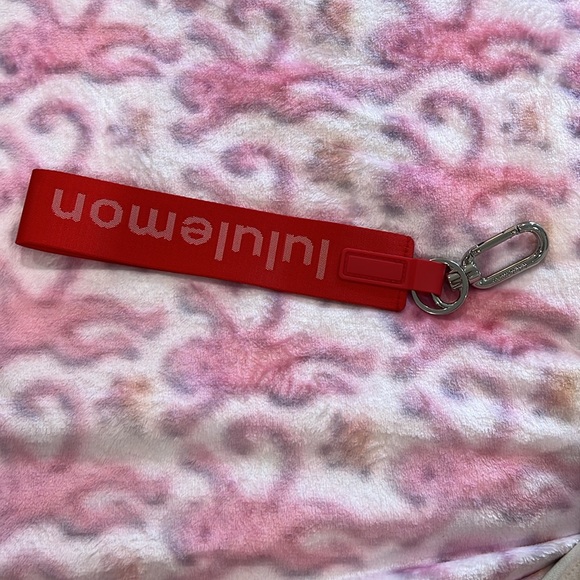 Lulu Red Lululemon Never Lost Keychain! Perfect condition! Red never lost - Picture 2 of 5